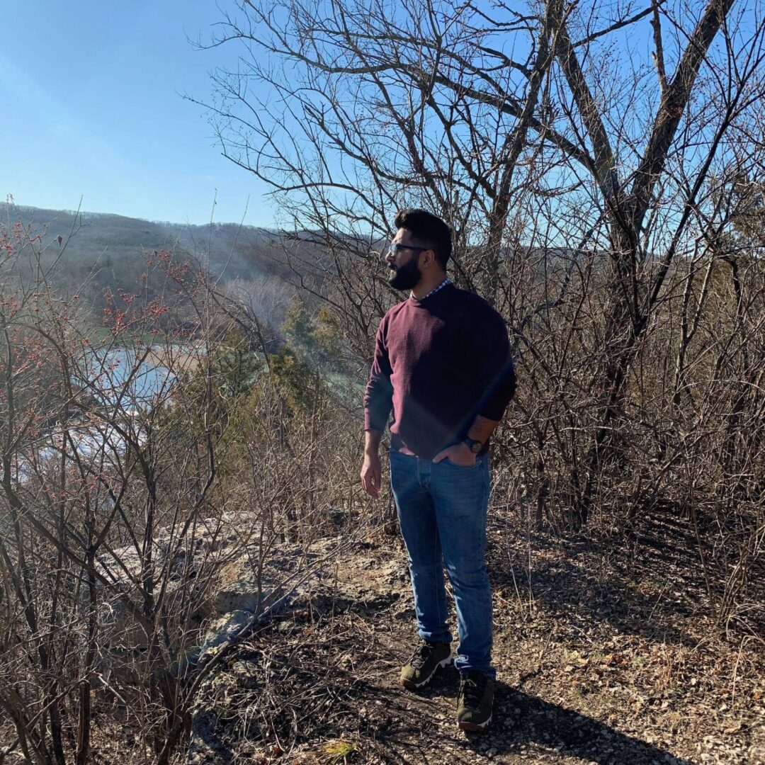 Individual looking at trees and landscape