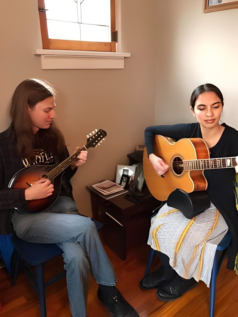 Acoustic duo performing in a cozy room
