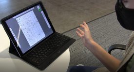 Person using tablet for document viewing