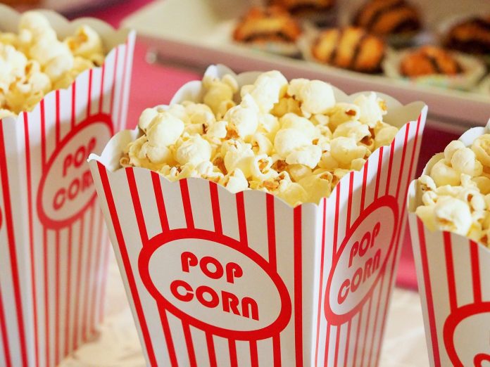 Popcorn in red-striped containers