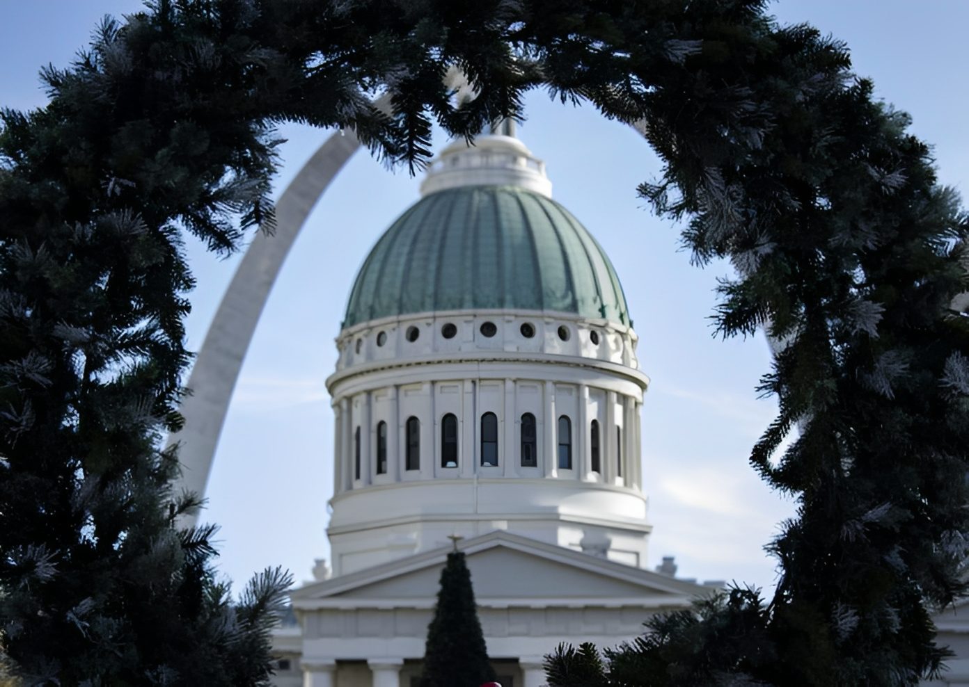 Dome and arch through holiday greenery