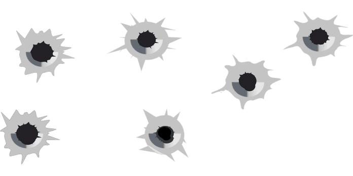 Bullet holes on black background