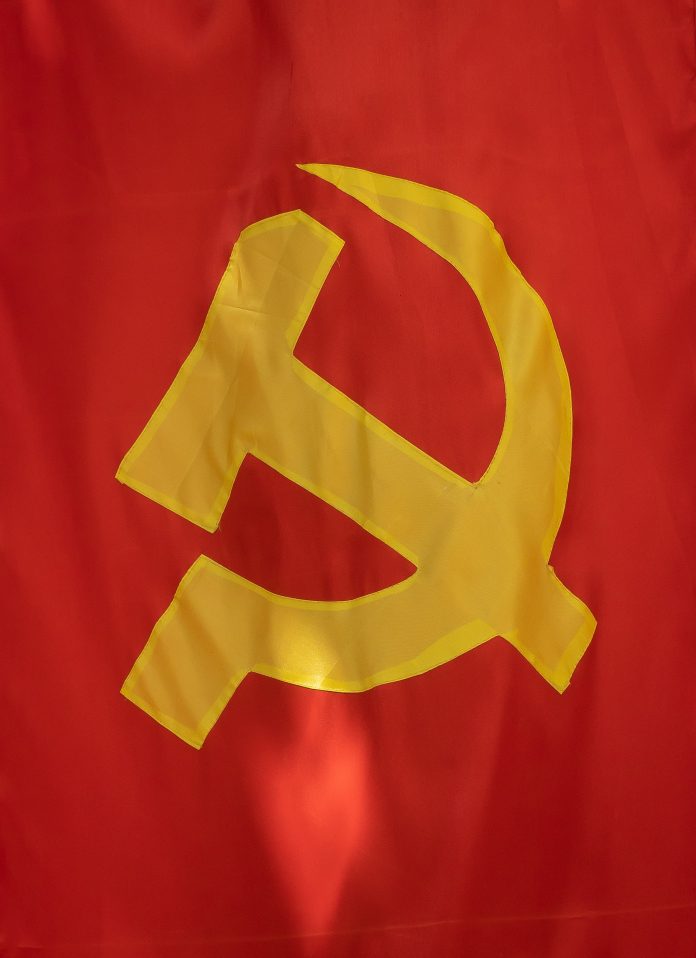 Communist symbol on a red background