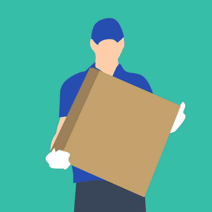 Delivery person carrying a large box