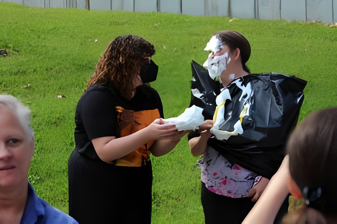 Person covered in whipped cream outdoors