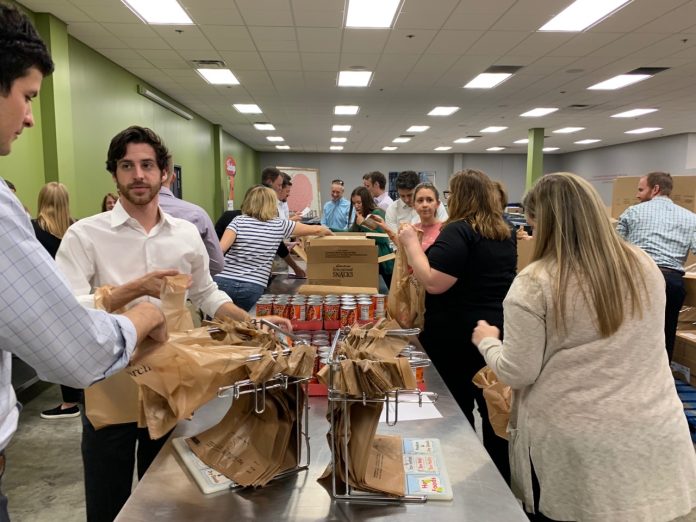 People organizing food items