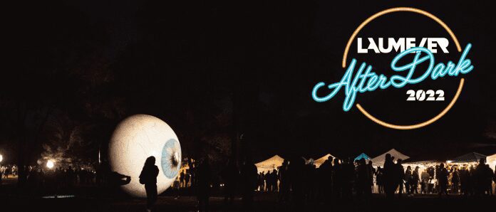 Giant eyeball sculpture at night festival