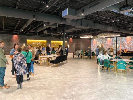 Guests mingling in a spacious venue.