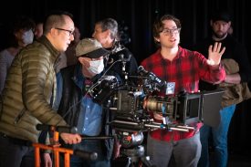 Filmmakers collaborating on set