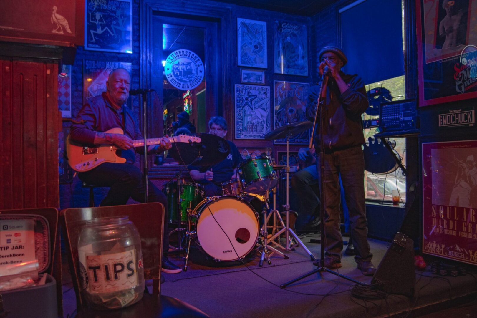 Live band performing at a dimly lit bar