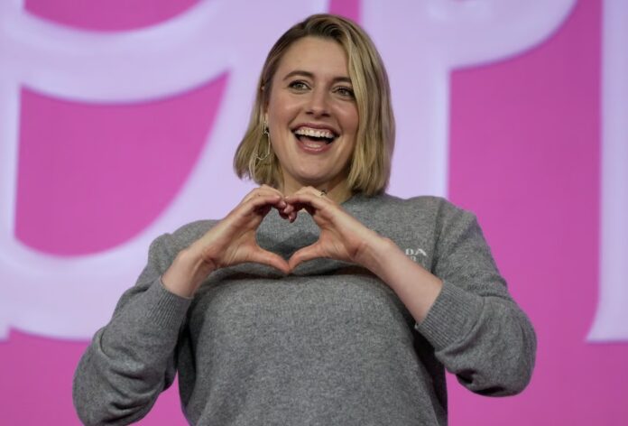 Happy individual forming heart shape