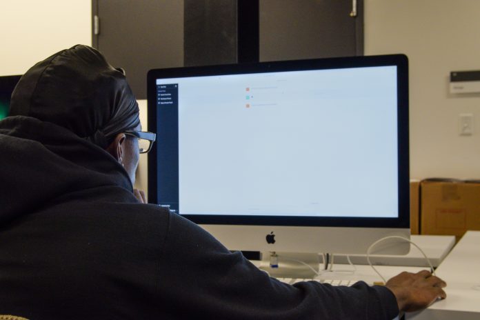 Person working on computer in office