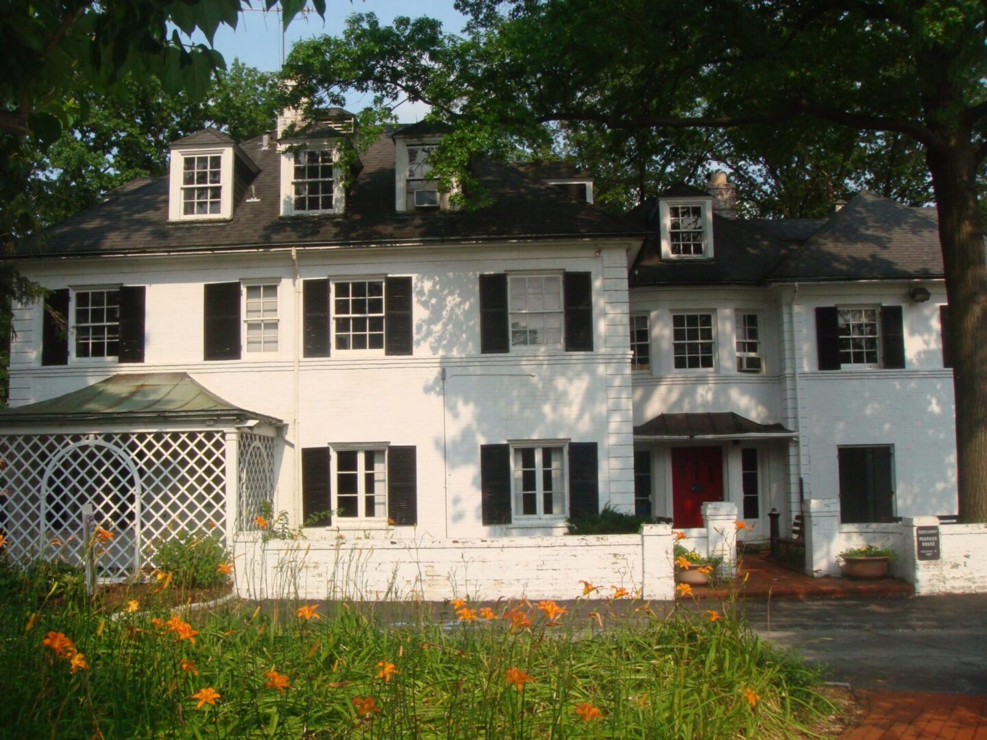 Traditional house with black shutters