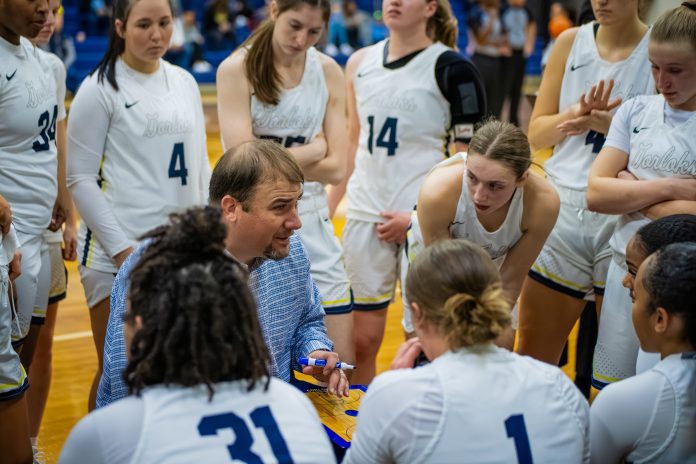 Players listening intently to coach
