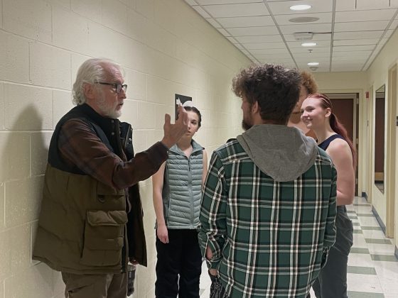 Group discussion in a hallway