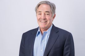 Smiling man in a suit jacket