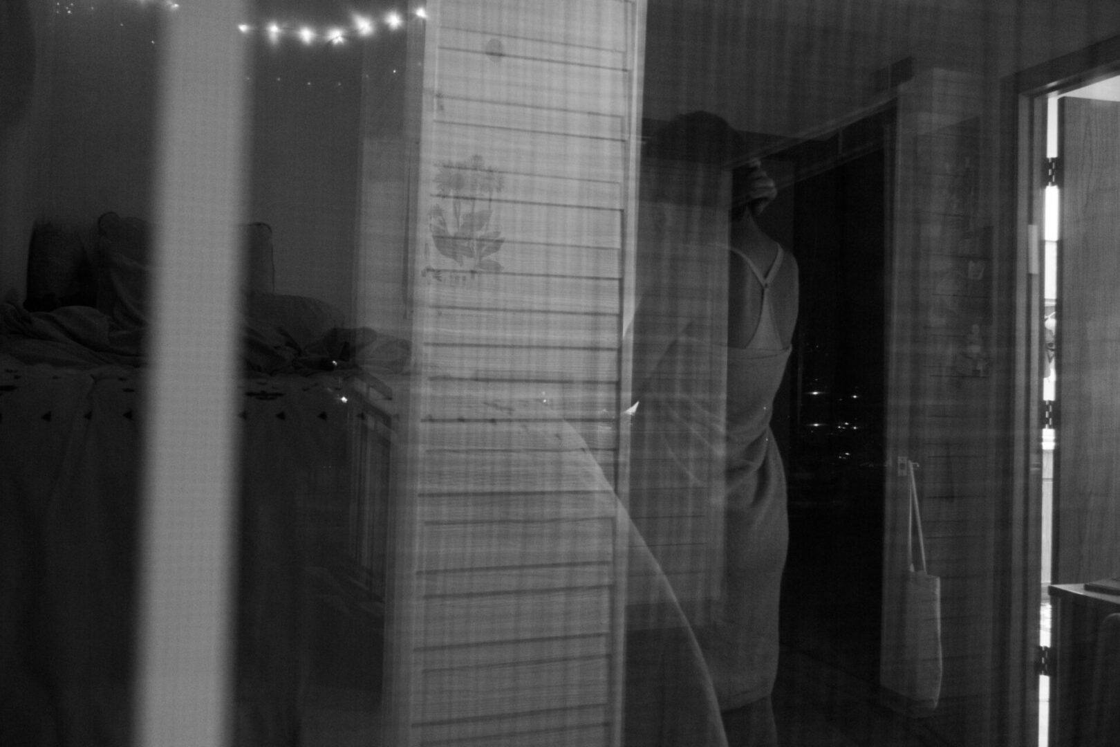 Reflection through window at night