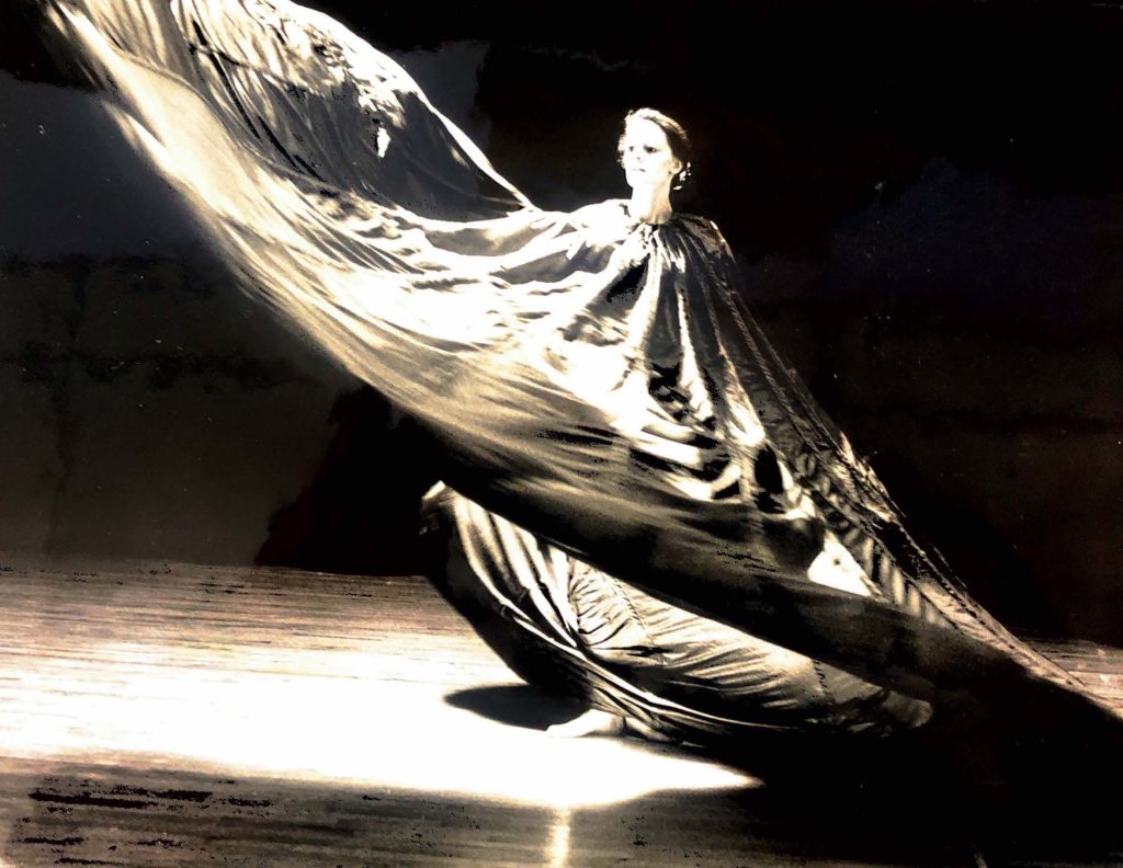 Graceful performance in dramatic lighting