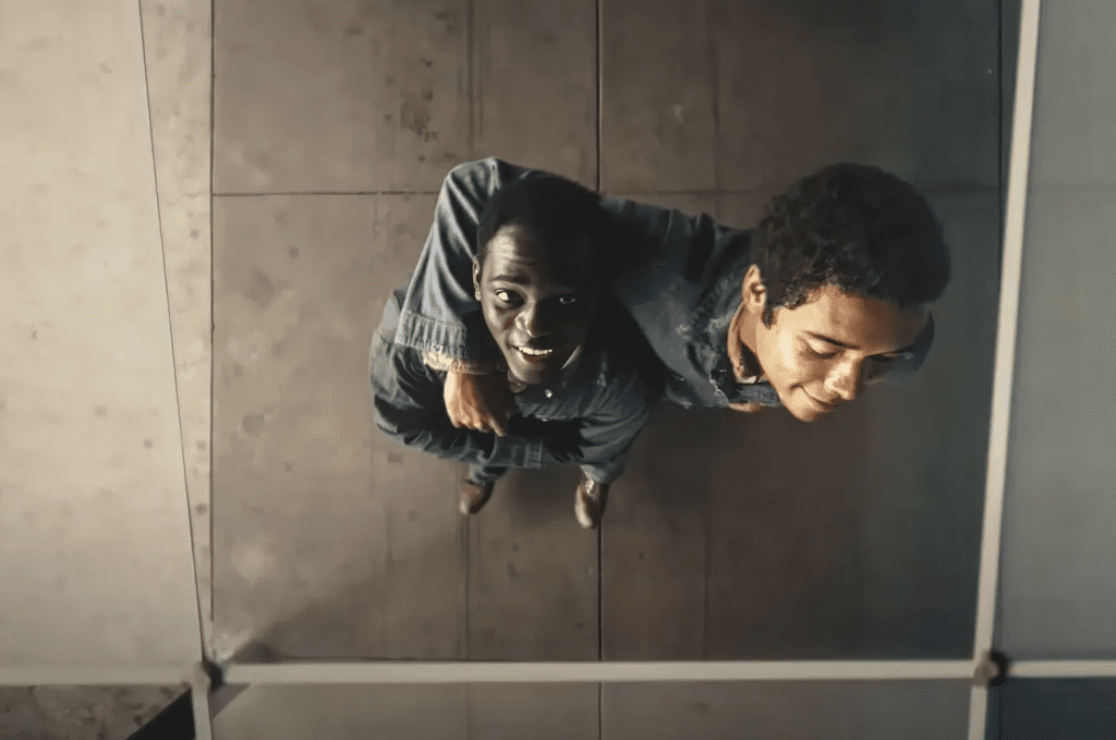 Two friends hugging, seen from above.
