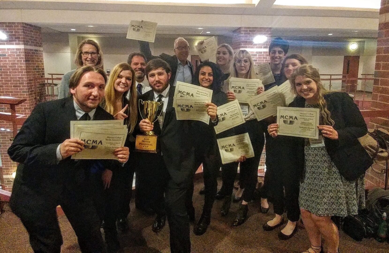 Award-winning group displaying achievements