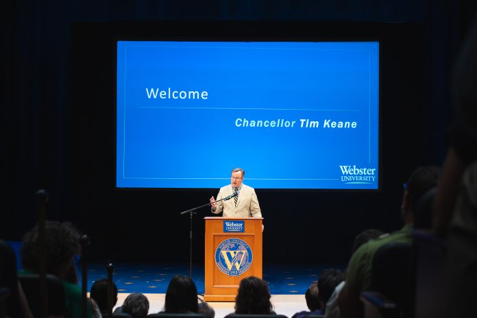 Speaker addressing audience at event