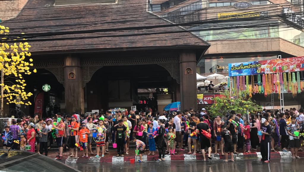 People enjoy festive street gathering