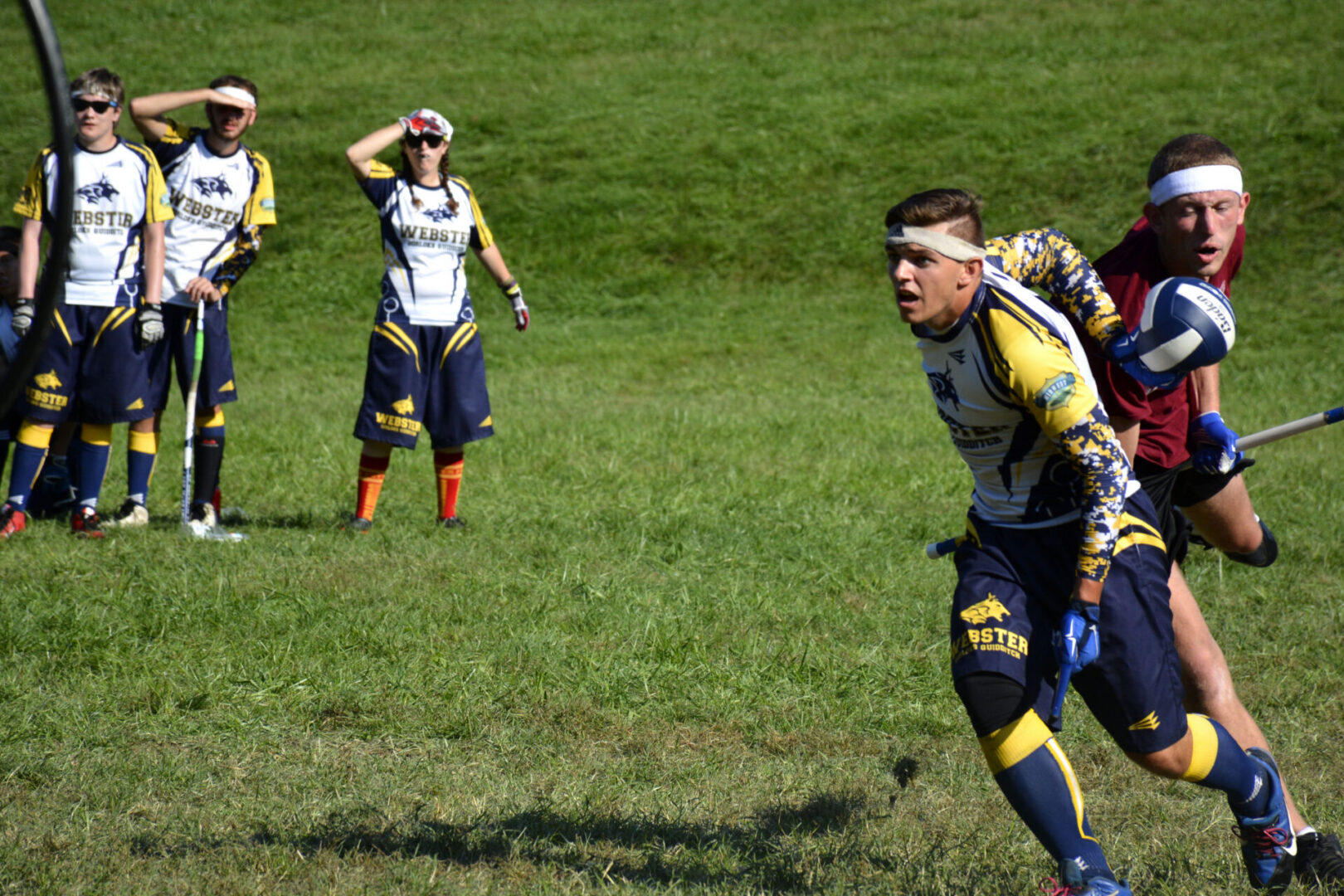 Athletes competing in a Quidditch tournament