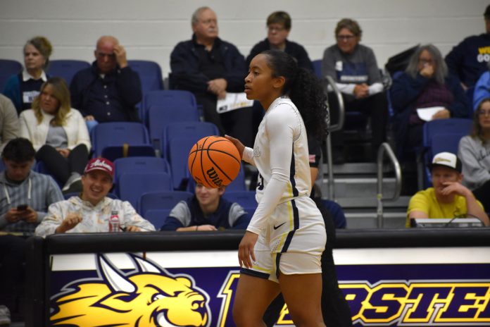 Basketball player dribbling during a game