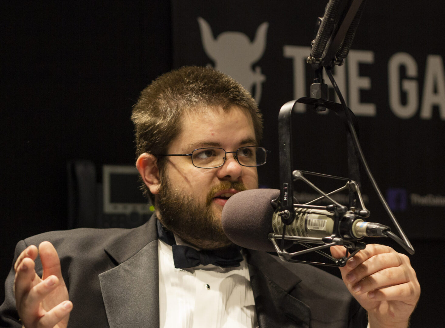 Man speaking into a microphone