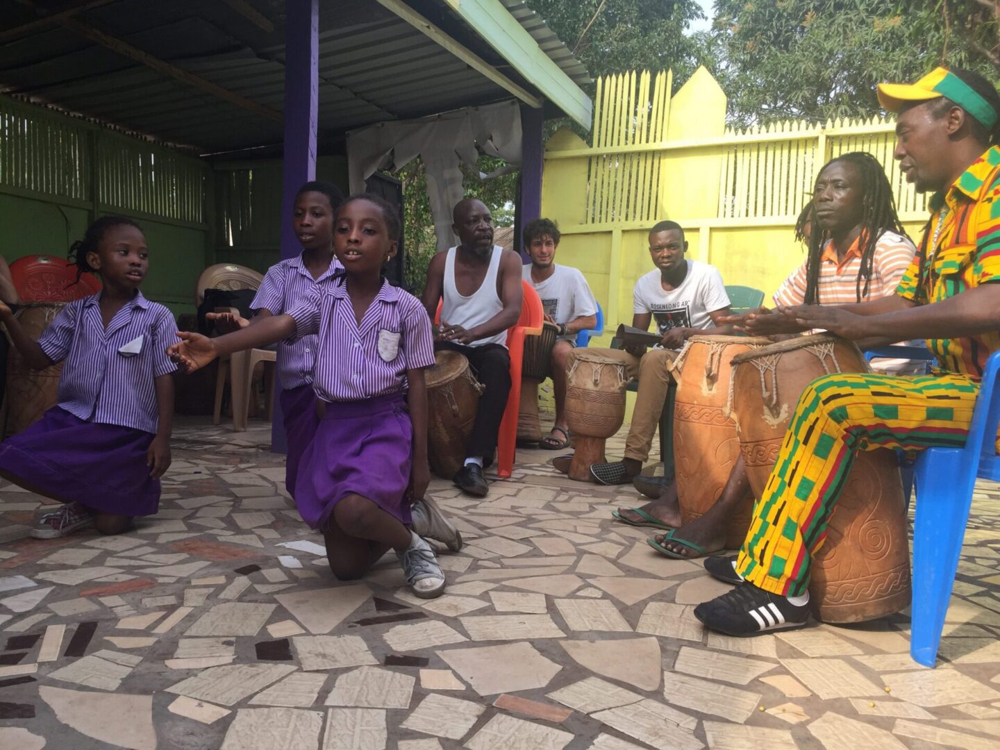 Group drumming session with children