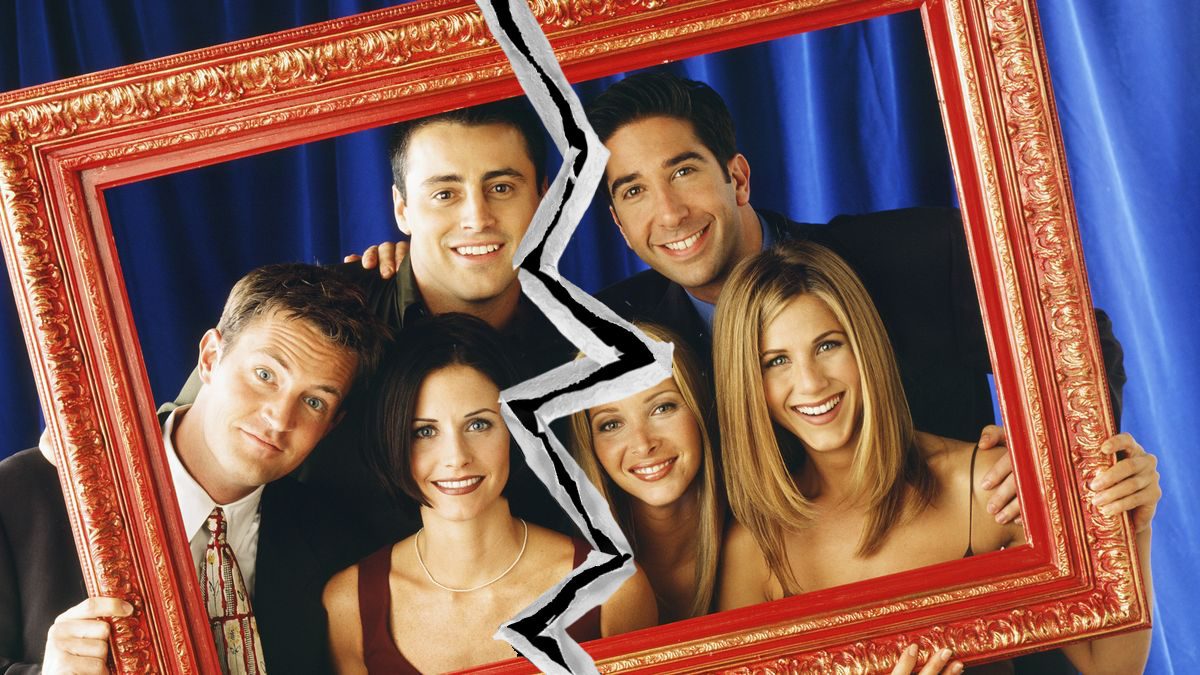 Friends posing behind cracked frame