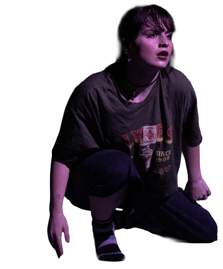 Pensive pose with purple lighting
