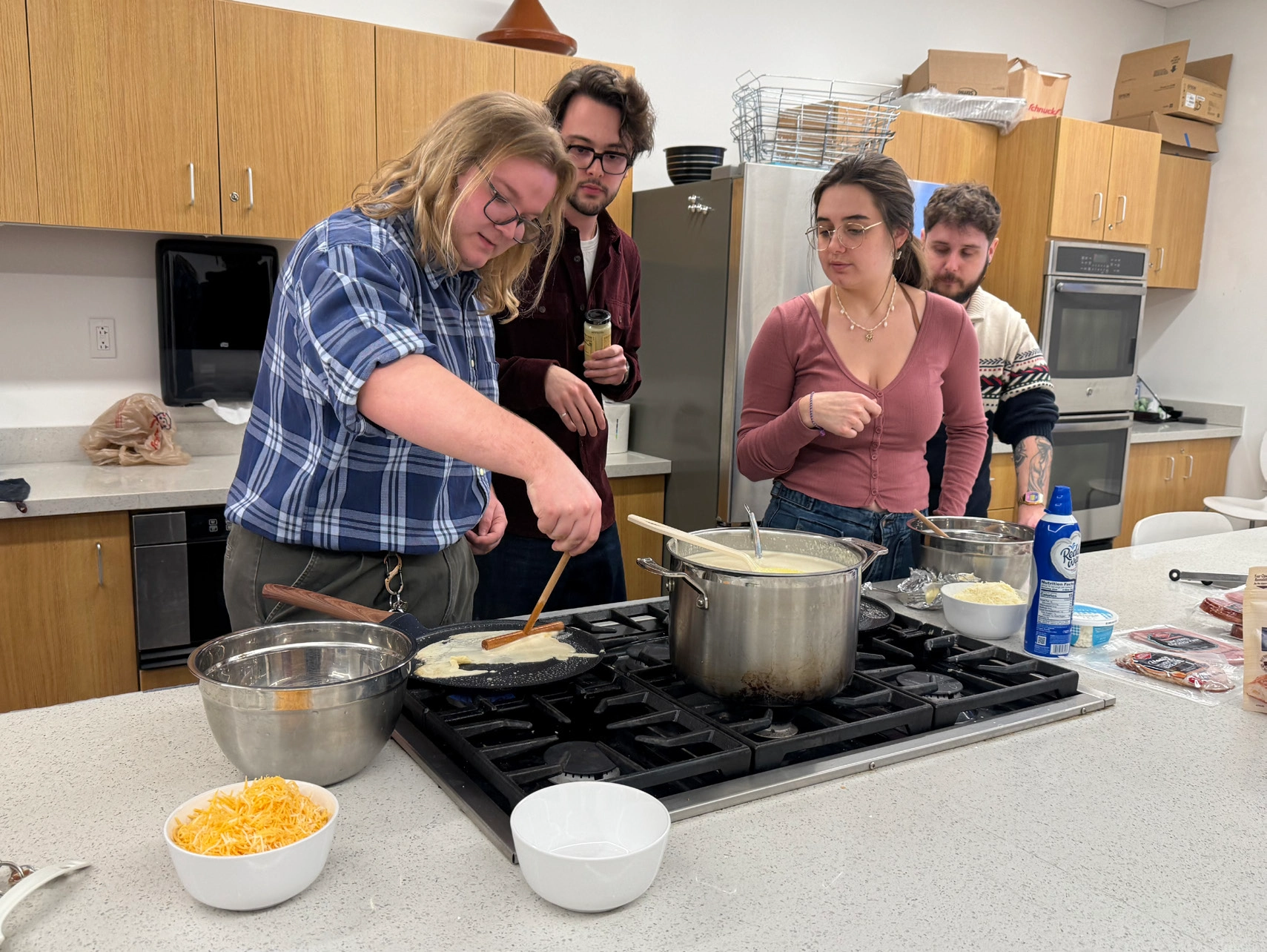 Friends making a meal together