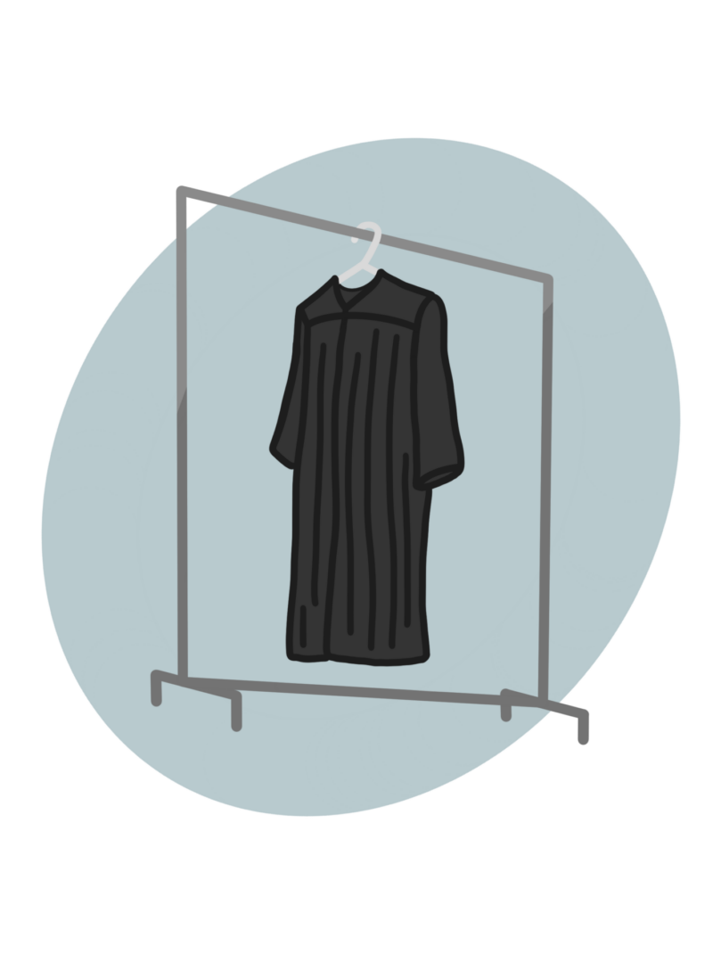 Black robe on clothing rack