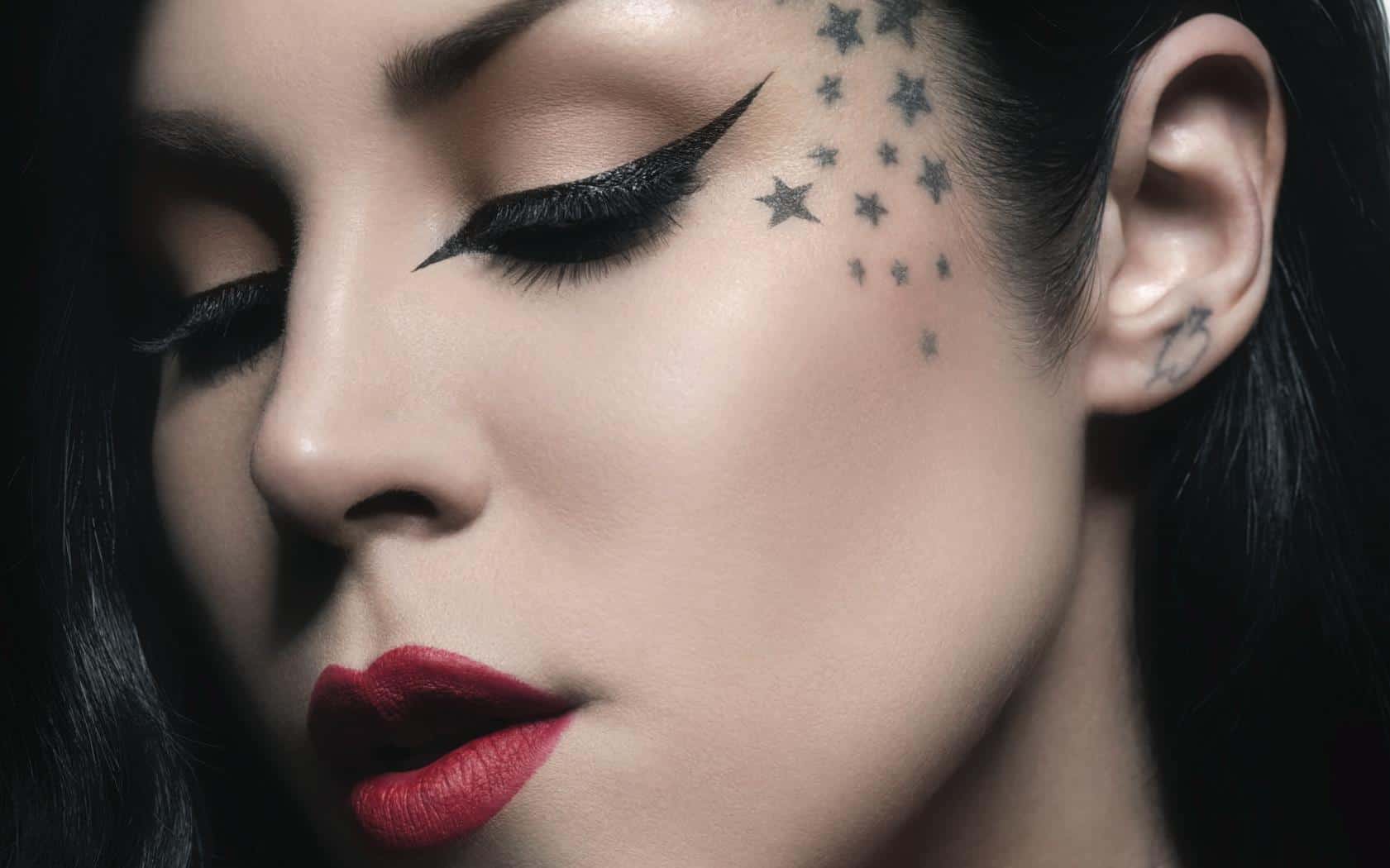 Elegant makeup with red lips and stars
