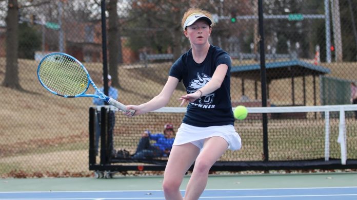 Athlete preparing for a forehand swing