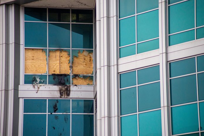 Office building with damaged window panels