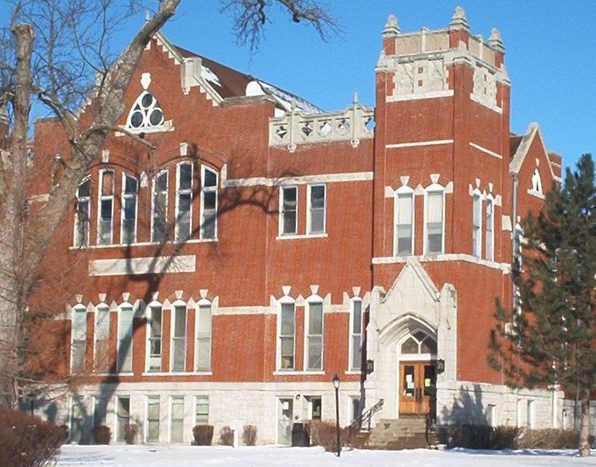Gothic-style architecture with snow-covered ground