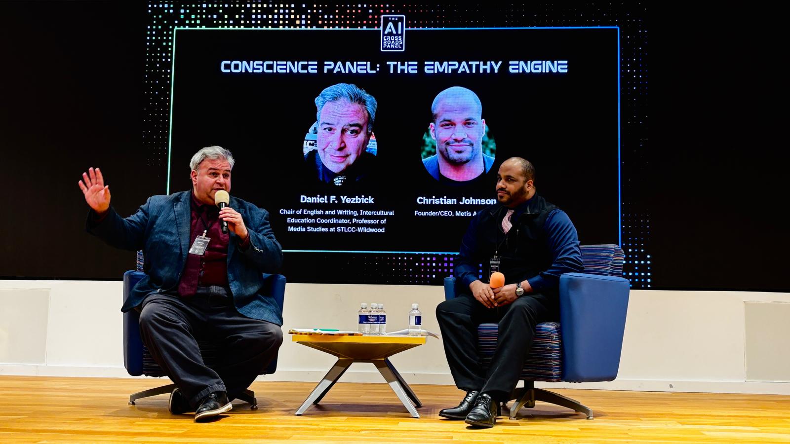 Panelist Daniel F. Yezbick and Christian Johnson speaking