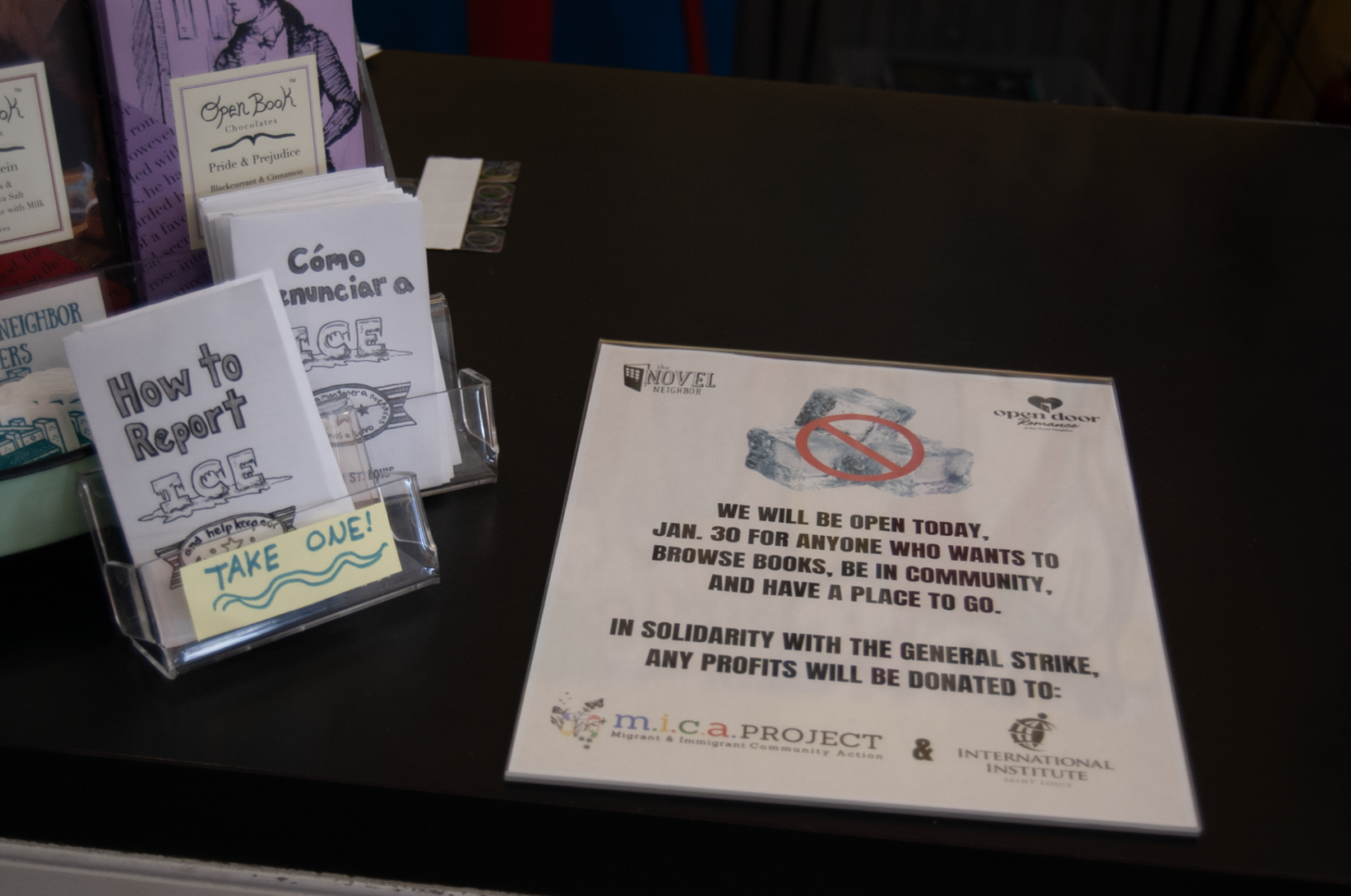 The Novel Neighbor displays zines about reporting ICE and keeping others in the community safe at their front counter. These zines were created by Megan Piontkowski and are available for anybody to view and print here. Photo by Ryann Barnash