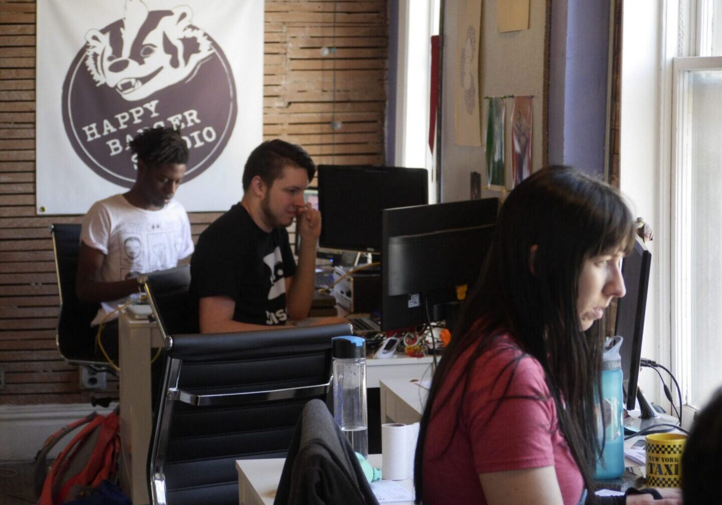 Office workers focused at their desks