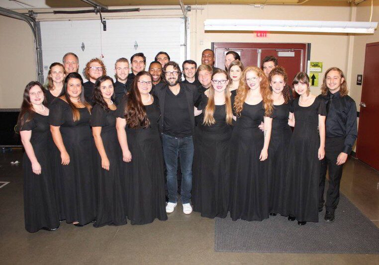 Group photo of choir members backstage