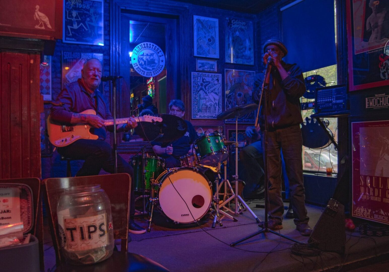 Live band performing at a dimly lit bar