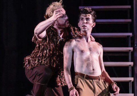 Theatrical scene with intense expressions