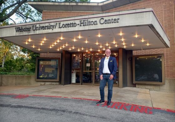 Man standing outside Loretto-Hilton Center entrance