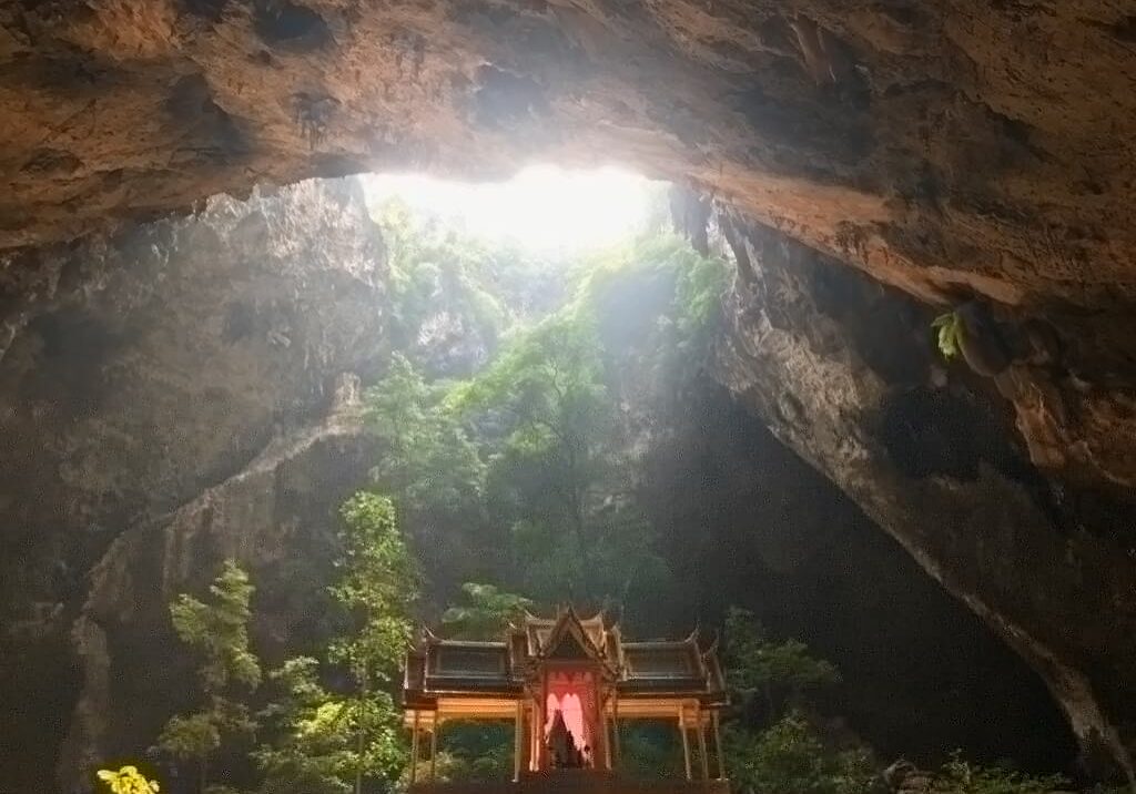 Temple illuminated by sunlight in cave