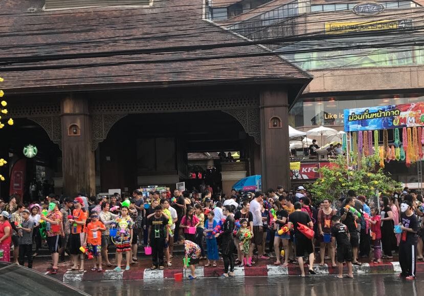 People enjoy festive street gathering