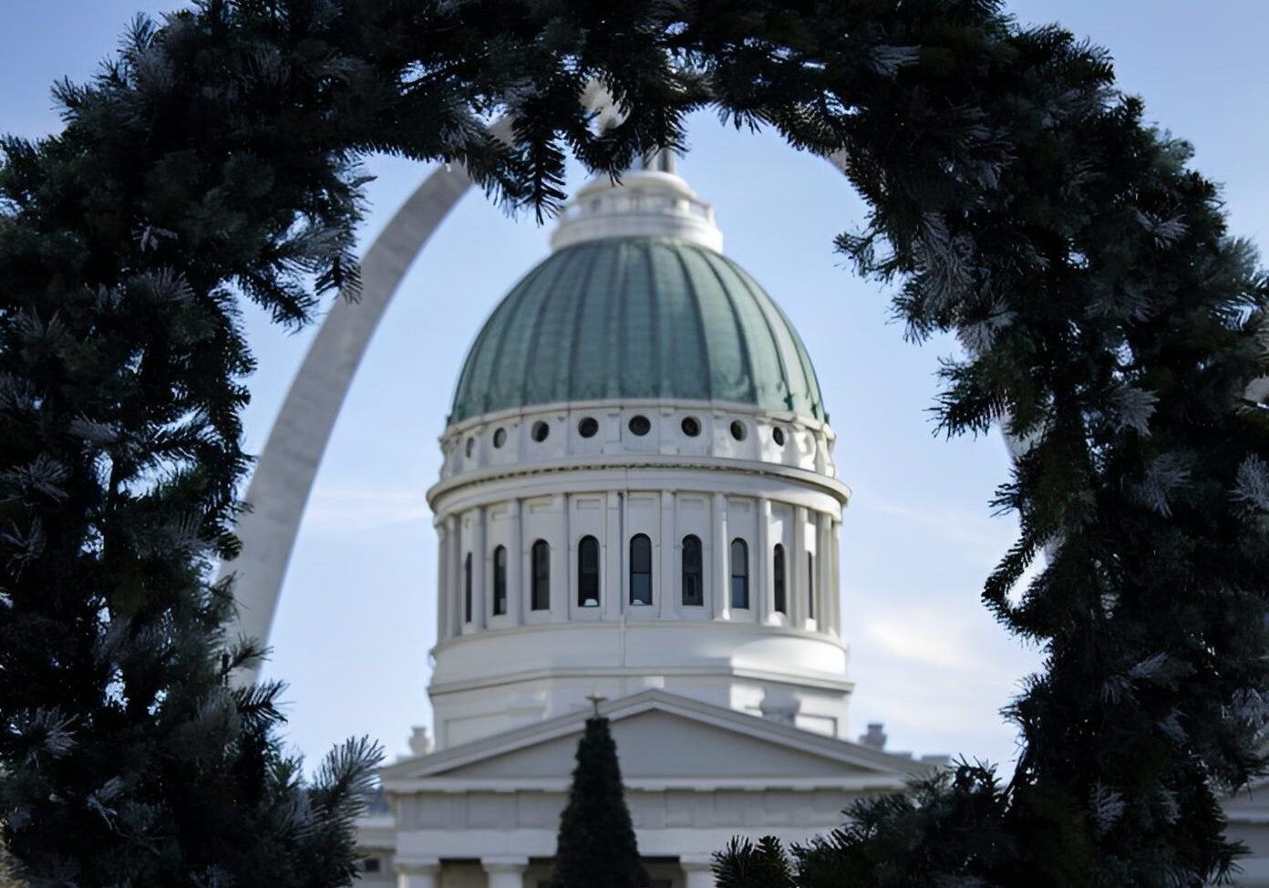 Dome and arch through holiday greenery
