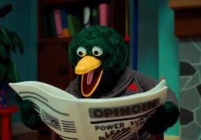 Puppet duck surprised by news