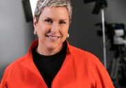 Confident woman with short hair indoors